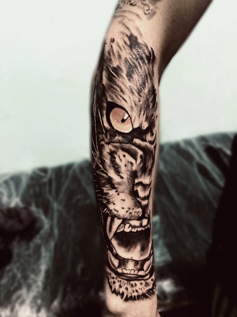 Tiger portrait realism forearm